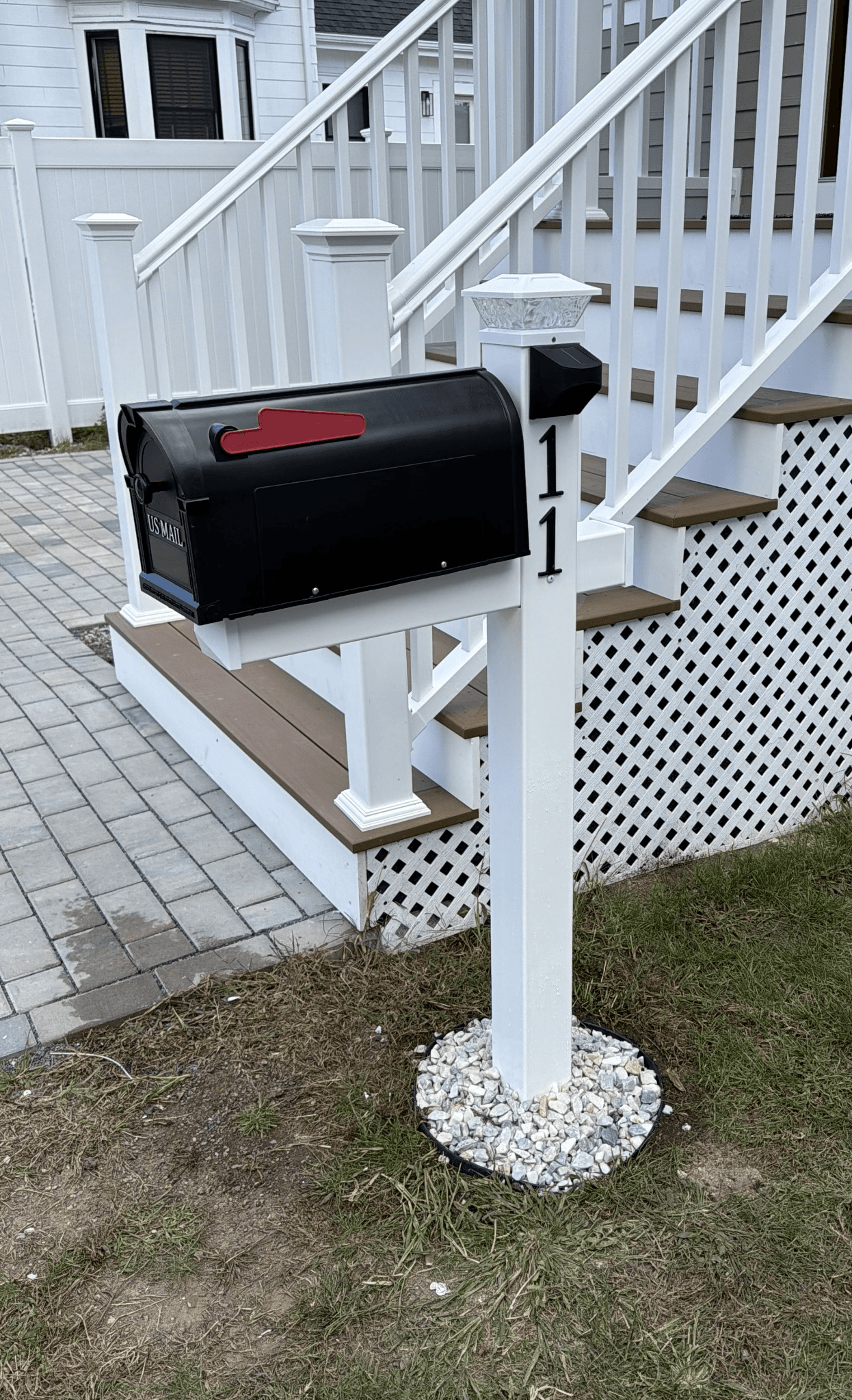 Mr Box white vinyl mailbox post with a black mailbox, solar cap light, and address numbers